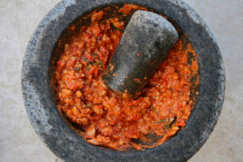Romesco in a motar and pestle 